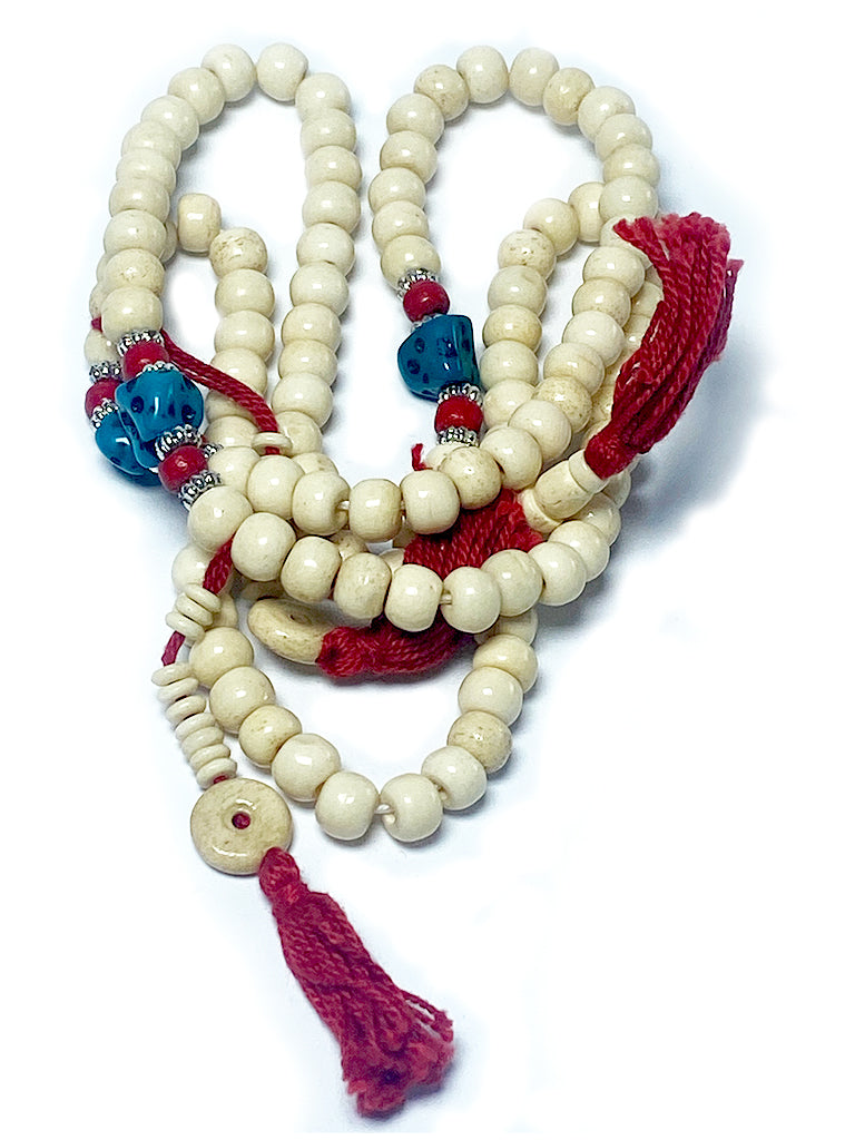 Tibetan bone mala spread out showing full length