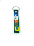 Om Mani Padme Hum mantra strap keychain front view showing all 6 syllables